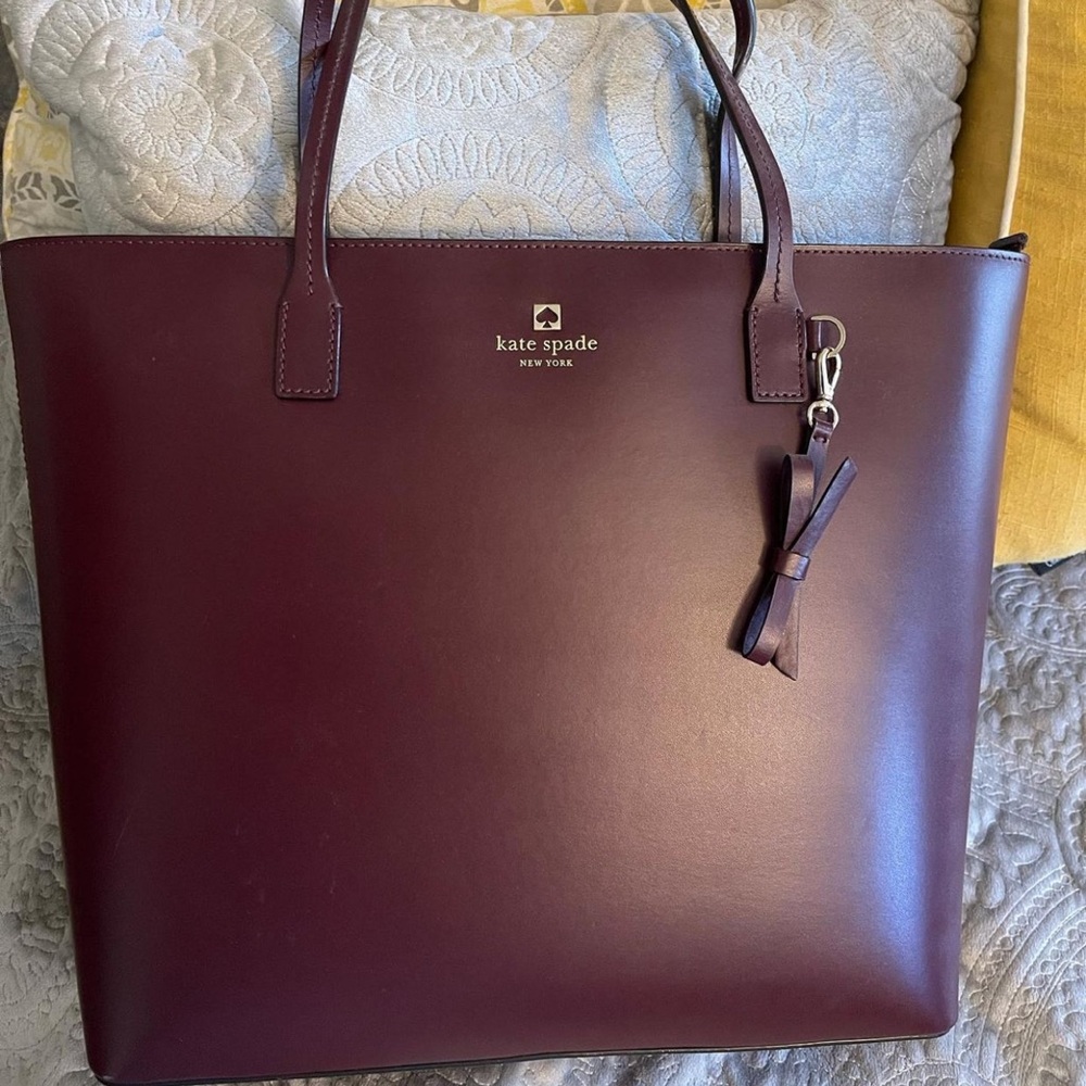 Kate Spade New York, burgundy bag w/ shoulder straps, worn once